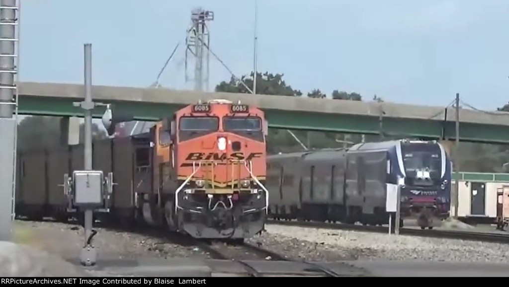 Amtrak passes BNSF coal train 